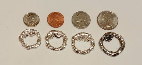 Judy Larson's Ribbon Wrapped Bracelet tips - , Wire Jewelry Design, Design, Four circular, textured silver-tone pendants